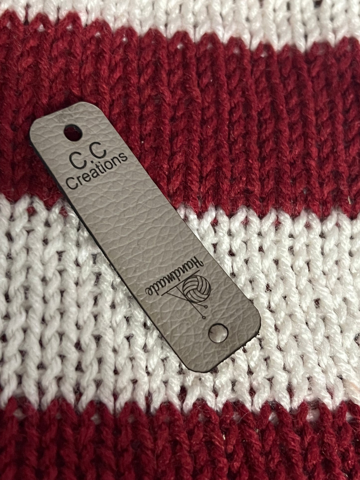 Leather tags knit