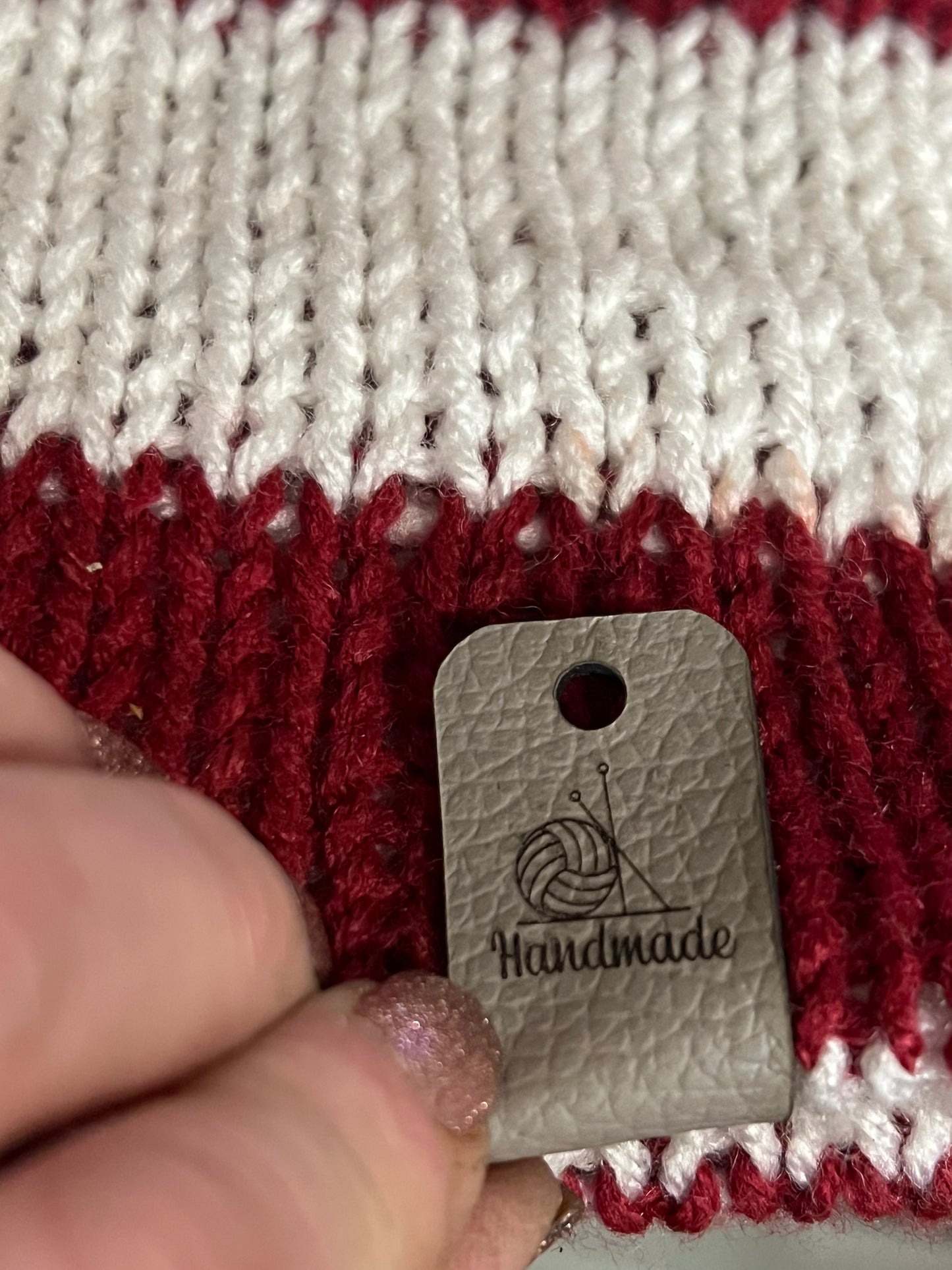 Leather tags knit