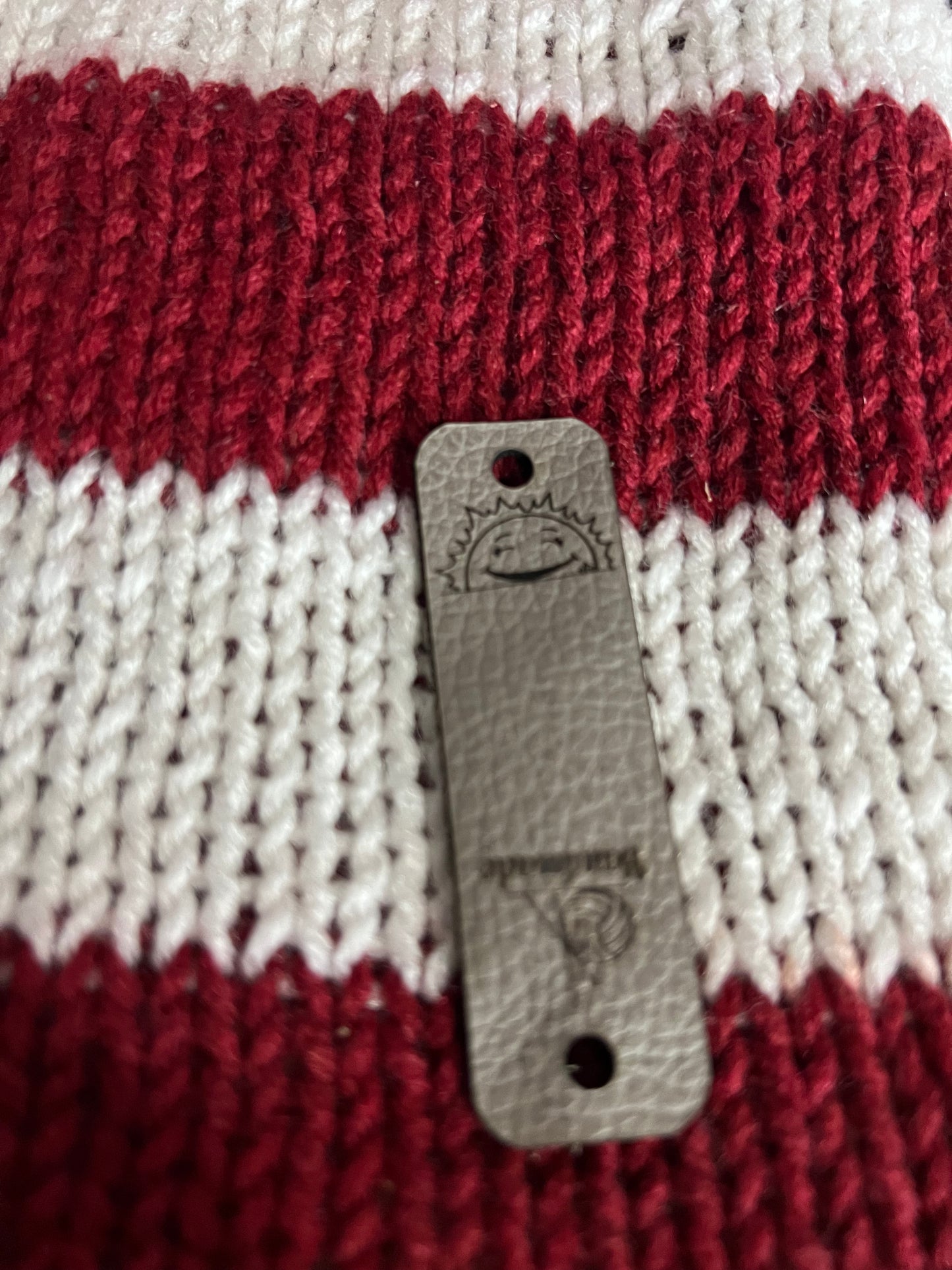 Leather tags knit